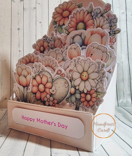 Side view of handmade floral box card showing layered die-cut blooms and Happy Mother's Day sentiment — Paperhugz Handpress Cards