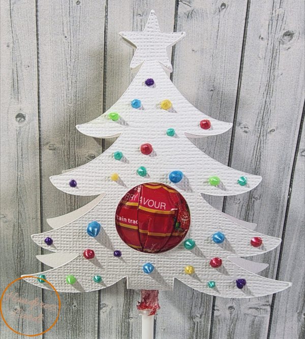 Handmade white Christmas tree lollipop holder with rainbow foiled baubles and star topper, by Handpress Cards